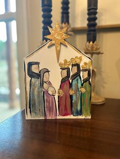 a nativity scene made out of paper and colored crayons