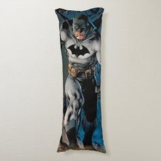 a batman pillow hanging on the wall with it's cover pulled back to reveal an image