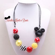 Mickey / Minnie Mouse inspired chunky bead, bubblegum necklace with adjustable length. Lobster Claw closure. 23 & Half inches long The red, yellow and black beads along with the yellow bow shaped beads, all come together to make this darling Minnie / Mickey Mouse inspired Chunky Bead, Bubblegum necklace one of the cutest even without having a Minnie Mouse pendant on it as the colors and the yellow bow beads really all say Minnie Mouse when they are put together just so. Plus it can be worn with Chunky Bead Necklace, Yellow Bow, Chunky Bead Necklaces, Bubblegum Necklace, Headband Jewelry, Minnie Mouse Birthday Party, Bling Necklace, Cake Smash Outfit, Bubblegum Beads