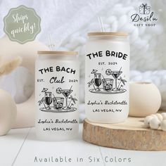 the bride and groom tumblers are next to each other on a white table with an egg