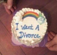 someone holding up a cake with the words i want a divine written on it