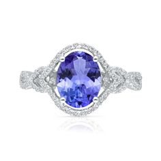 2.00 Carat Tanzanite Ring with .28 ct. t.w. Diamonds in 14kt White Gold. Size 7 | Ross-Simons Oval Tanzanite Diamond Ring In White Gold, Oval Tanzanite Diamond Ring For Anniversary, Elegant Oval Tanzanite Rings, Oval Tanzanite Diamond Ring With Accent Stones, Oval Tanzanite Ring With Brilliant Cut, Oval Tanzanite Rings Fine Jewelry, Oval Tanzanite Jewelry With Halo Design, Tanzanite Rings, Morganite Pendant