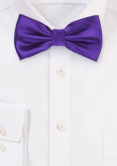 When it comes to men’s suits for weddings, purple is a definite hit. Wearing this magnificent Regency Solid Bowtie will allow you to take risks that you have never taken before. This shade of purple is a favorite option when it comes to weddings, and we adore how striking and unique it looks in this setting. When shopping for the suit's accessories, buy a matching pair of pocket squares with a white or ivory buttoned up shirt. Wear a greyish, beige, black, or white suit or a tuxedo of your prefe Classic Purple Tuxedo For Semi-formal Events, Fitted Purple Tuxedo For Party, Fitted Purple Tuxedo For Semi-formal Occasions, Fitted Purple Tuxedo For Semi-formal Events, Fitted Purple Suit And Tie Accessories For Party, Fitted Purple Tuxedo For Wedding, Purple Fitted Wedding Tuxedo, Wedding Purple Fitted Tuxedo, Elegant Purple Fitted Tuxedo