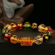 Discover the allure of prosperity and protection with our exquisite Pi Xiu Artificial Crystal Color 12mm Bracelet. Meticulously crafted to combine elegance with powerful symbolism, this bracelet is not just an accessory but a statement of style and good fortune. Features: Premium Quality: Made from high-grade artificial crystals, each bead is carefully polished to a smooth, radiant finish. Pi Xiu Charm: Known as a powerful Chinese talisman, the Pi Xiu (or Pixiu) is believed to attract wealth, wa Nyc Boutiques, Good Luck Bracelet, Couple Bracelet, Lucky Bracelet, Bangles Bracelets, Fitness Bracelet, Bracelet Women, Couple Bracelets, Bracelets Jewelry