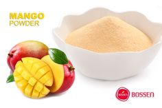 mango powder in a white bowl next to two pieces of fruit on a white background