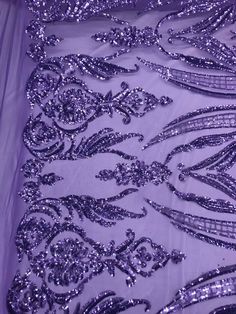 Description Make a style statement with this Purple Arabic Design 4 Way Stretch Sequins by the Yard Fabric. Bridals can use sequin stretch fabric, dancers, and models & have a splendid look, which makes your personality so attractive when you wear it. Purple Arabic Design Embroidered 4 Way Stretch Sequin Fabric We have a lot of fabric at our store to light up your wedding day. A luxurious Design sequins mesh lace cording winds through clustered of meticulously folded edge on both ends. The sheer Embellished Purple Sequin Fabric For Party, Purple Embellished Sequin Fabric For Party, Glamorous Embroidered Sequin Fabric For Party, Embellished Purple Sequin Fabric For Glamorous Designs, Embellished Purple Sequin Fabric For Glamorous Style, Embellished Purple Sequin Fabric In Glamorous Style, Purple Embellished Sequin Fabric For Evening, Fitted Purple Sequin Fabric With Contrast Sequins, Purple Sequin Fabric With Rhinestones For Party