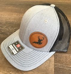 Richardson 112 Hat with Engraved Leatherette Patch Deer Silhouette Engraved on Leatherette Patch Custom Hats Men, Adjustable Gray Trucker Hat, Adjustable Hats With Leather Patch As Gift, Gray Flat Bill Hat For Outdoor Activities, Adjustable Gray Hat For Gift, Gray Flat Brim Hat For Outdoor Activities, Leather Patch Cap As A Gift, Leather Patch Cap As Gift, Leather Patch Cap - Gift