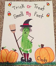 a child's halloween card with a green monster holding a broom and pumpkins