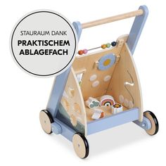 an image of a wooden baby's play set with the words praktischem ablagefach