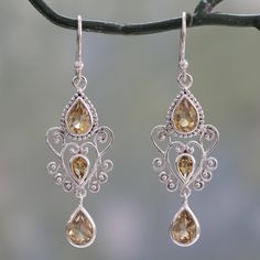 Cast your own spell of enchantment with these mesmerizing earrings from India's Shubhra Singh. Elaborate heart-shaped motifs in sterling silver are flanked top and bottom by teardrops of citrine. The dangle earrings feature over 3 carats of the golden gemstone, including smaller teardrops at the hearts' centers. The earrings sway on sterling silver hooks. .925 Sterling silver Enchanted Princess, Fine Silver Jewelry, Jewelry Bracelets Silver, Leaf Motif, Silver Jewels, Silver Dangle Earrings, Sterling Silver Dangle Earrings, Dream Jewelry, Silver Earrings Dangle