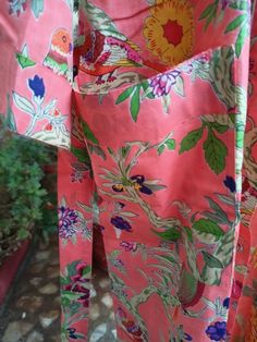 This Robe we makes from 100% Cotton printed fabric. The fabric print is Anokhi Floral which is very popular in all over the world . We use pure cotton cambric fabric . This is free One size robe . There is both side pocket in robe. Length = 120 cms. ( 48 inches) Traditional Pink Floral Print Kaftan, Traditional Pink Kaftan With Floral Print, Traditional Pink Printed Kaftan, Gown With Belt, Cotton Kimono, Night Wear, Swim Wear, Fabric Print, Bird Print