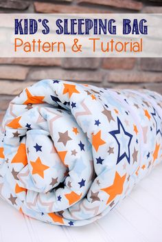 a baby sleeping bag with stars on it and the words, kid's sleeping bag pattern