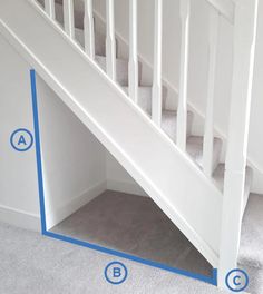 the bottom half of a stair case is shown with blue tape around it and below