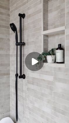 the shower head and hand held shower faucet are shown in this bathroom