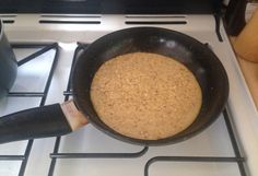 a frying pan sitting on top of a stove