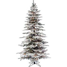 a white christmas tree with snow on the top and lights in the bottom branches, against a white background