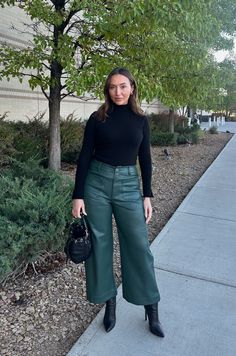 Elevate your wardrobe with our green faux leather wide leg pants. These luxe pants feature a cropped length and wide leg design, perfect for any occasion. Made with high-quality faux leather, they provide a fashion-forward look without compromising on comfort. The perfect combination of style and functionality. high waisted butter soft faux leather front pockets and back pockets true to size 100% polyester wash cold on gentle cycle inside out model is wearing a medium Christmas Outfit Green Pants, Green Leather Pants Outfit, Green Flare Dress, Leather Pants Wide Leg, Wide Leg Leather Pants, Cropped Leather Pants, Green Leather Pants, Faux Leather Wide Leg Pants, Luxe Pants