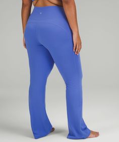 A coveted classic. These flared pants are perfect for your practice and beyond. Designed for Yoga. Hugs your body from waist to hem:Flares out from the knee to hem:Full length intended to sit just off the ground. Back drop-in waistband pocket holds a card, key, or cell phone. This collection's great for low-impact workouts like yoga or whenever you want to feel really, really comfortable. Fitted Lululemon Bottoms, Fitted Straight Leg Lululemon Bottoms, Lululemon Fitted Straight Leg Bottoms, Fitted Full-length Lululemon Pants, Lululemon Fitted Full Length Pants, Lululemon Casual Yoga Pants, Blue Stretch Lululemon Bottoms, Blue Stretch Bottoms By Lululemon, Blue Stretch Bottoms From Lululemon