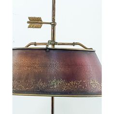 a lamp that has an arrow on it