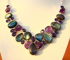 Natural Labradorite and Raw Amethyst stone handmade cluster necklace | Bridesmaid necklace | Vintage necklace | Gifts for her stone name - Labradorite and Raw Amethyst stone color - As picture metal plating - silver oxidized material - brass For more cluster jewelry https://www.etsy.com/shop/Roynsilverarts?ref=seller-platform-mcnav   THANK YOU. Cluster Jewelry, Raw Amethyst, Cluster Necklace, Bridesmaid Necklace, Necklace Vintage, Amethyst Stone, Vintage Necklace, Gift Necklace, Stone Color