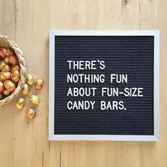 there's nothing fun about fun - size candy bars written on a black board