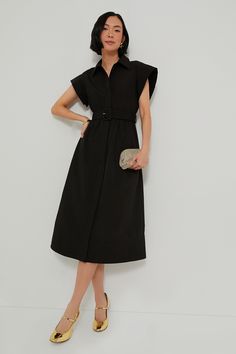 Elegant in its simplicity, the structured and ultra-ladylike Black Chloe Dress is done in a textured cotton-blend fabric that is sure to turn heads for its design details. The moire pattern throughout and trapunto stitching on the sleeves, placket, and hemline complete this midi moment, making it feel extra special with minimal effort. Pair with heels or flats, sunnies or statement earrings, for day or night, and rest assured that you look fabulous! Spread collar Short wing sleeves Button front Elegant Cotton Midi Dress For Work, Elegant Cotton Dress For Work, Elegant Cotton Workwear Dresses, Structured Black Midi Dress, Black Structured Midi Dress, Black Dress With Structured Shoulders For Work, Spring Black Dresses With Structured Shoulders, Black Midi Dress With Structured Shoulders For Work, Black Spring Dresses With Structured Shoulders