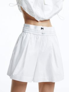 MO&Co. Women's Elasticated Double Waist Shorts Get the ultimate comfort and style with our shorts. The lightweight material and double waist design provide a relaxed fit, while the side pockets add convenience. Pair with our matching jacket for a casual yet sporty look. Features : - Loose fit, pleated design- Double elasticized drawstring waistband- Double-side pocket, UPF 40+ sun protection Code: MBD1SOTT04The back length of size S is 37.4cmMATERIALS & CARE Material: 100% ElastomultiesterPlease Sporty Spring Daywear Bottoms, Spring Athleisure Bermuda Bottoms, White Bottoms With Functional Drawstring For Spring, White Bottoms With Functional Drawstring, Drawstring Bottoms Shorts For Daywear, Sporty Short Bottoms For Daywear, White Shorts With Functional Drawstring For Summer, White Summer Shorts With Functional Drawstring, Sporty Relaxed Fit Shorts For Daywear