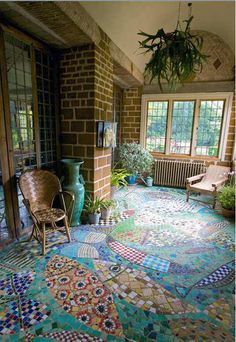 a room filled with lots of colorful tiles on the floor