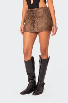 Mini skirt Front lace up detailing Zip back closure Faux Leather Model wears size S Model height is 5'7 Item care: Hand wash Leather Miniskirt, Faux Leather Mini Skirt, Leather Mini Skirt, Swimwear Dress, Metallic Dress, Leather Mini Skirts, Swimwear Accessories, Leather Mini, S Models