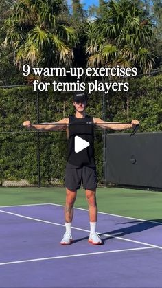 a man standing on top of a tennis court holding a racquet in his hands