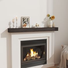 a fire place in a living room with white walls