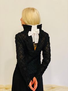 Elevate your wardrobe with the sophistication of our Black Unique Linen Women's Jacket by Aiste Anaite. Designed for special events or daily life, this piece seamlessly merges artistic craftsmanship with everyday elegance. Each jacket is a wearable work of art, featuring sculptural details on the fabric and an extra collar for added flair. With the option for custom orders, you can make this unique piece truly yours. ☑ Key Features: *Artistic Sculptures: Experience wearable art with sculptural d Tailored Tops For Formal Winter Occasions, Classic Black Outerwear For Party, Classic Tailored Top For Party, Tailored Elegant Tops For Party, Tailored Black Top For Evening, Classic Black Party Outerwear, Chic Formal Winter Tops, Elegant Evening Tops For Winter, Tailored Long Sleeve Evening Tops