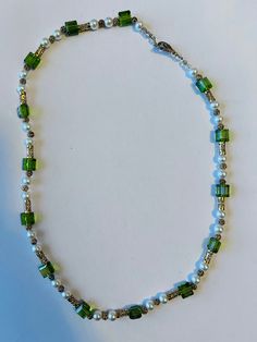 Beautiful handmade beaded necklace. Has pops of green and pearl accents throughout. Perfect for a night out or to the office! Handmade Beaded Necklace, Green Beaded Necklace, Necklace For Her, Handmade Beaded Necklaces, Valentines Day Gifts For Her, Valentines Necklace, Green Necklace, Necklace Gift, Chain Styles