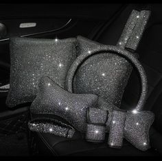 the interior of a car is decorated with silver sequins and bowknots