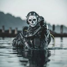 a man in scuba gear is floating in the water