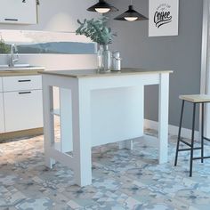 a kitchen with two stools next to a white table and some plants on the counter