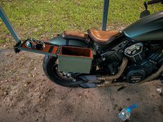 This is an ammo can saddle bag for the Indian Scout Bobber. It is lined with high quality, hand dyed leather, and features a place for all your important tools to keep your valuable storage space open. This product also features a pocket for storing paperwork out of the weather. The lid was also made functional by adding a location to store 2 pairs of glasses for day and night riding, and a strap for your gloves.  With the box, you also receive all necessary mounting hardware to install onto you Storing Paperwork, Indian Bobber, Indian Scout Bobber, Scout Bobber, Diy Motorcycle, Night Riding, Indian Scout, Side Bags, Saddle Bag