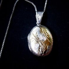 "Victorian style vintage 1970, sterling silver 925 SU   necklace with etched , gold plated   , oval shape locket pendant. Made in Italy. Delicate chain with oval bar logo market : 925, Italy. The pendant  market : 925 SU ( made in Italy). Delicate, stylish, classy,  unique. Gently  used condition, well kept without any damage  , repairs or discoloration,  clean and strong inside  and out. The mechanism  work well . You can use  as a  gift. Length of the chain: 20,0\" Size of the pendant: 0,6\"x Cheap Vintage Oval Pendant Necklaces, Antique Medallion Necklace Stamped 925, Handmade Gold Oval Pendant Locket Necklace, Vintage Sterling Silver Oval Pendant Locket Necklace, Gold Sterling Silver Locket Necklace, Stamped 925 Medallion Necklace For Anniversary, Heirloom Oval Etched Necklace, Victorian Pendant Necklace Stamped 925, Victorian 925 Stamped Pendant Necklace