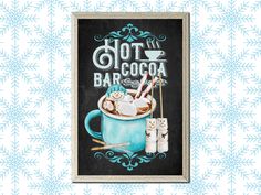 a chalkboard sign that says hot cocoa and marshmallows in a cup