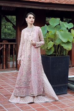 Brand: EZRACollection: Ermina by Ezra Unstitched Luxury Wedding CollectionFabric: Net DESIGN DETAILS: Embroidered Hand Embellished Centre(front) Panel (net) Embroidered Hand Embellished Right (front)panel (net) Embroidered Hand Embellished Left Panel (net) Embroidered Hand Embellished Sleeves (net) Embroidered Daman Boarder (net) Embroidered Back Spray (net) Embroidered Dupatta (net) Attached Dupatta Pallu Dyed Inner (silk) Foil Printed Trouser (raw Silk) DISCLAIMER:* Lining, Laces, and Tassels Formal Unstitched Hand Embellished Salwar Kameez, Hand Embellished Unstitched Salwar Kameez For Formal Occasions, Hand Embellished Anarkali Unstitched Suit For Wedding, Traditional Pink Hand Embellished Salwar Kameez, Pink Hand Embellished Organza Anarkali Set, Bollywood Style Hand Embellished Unstitched Wedding Suit, Bollywood Hand Embellished Unstitched Suit For Wedding, Embroidered Floor-length Lawn Suit For Reception, Formal Pink Anarkali Set With Intricate Embroidery