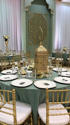 the table is set with place settings for dinner