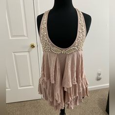 Brand New Top, Pale Pink Color With Beautiful Embellishment. Very Small Rip From Another Tag. Reason Why The Discount. See Pictures Please. Embellished Summer Vest, Bohemian Sleeveless Tank Top For Party, Chic Sleeveless Embellished Tops, Sleeveless Sequin Tops For The Beach, Sequin Sleeveless Top For The Beach, Chic Embellished Tank Top, Chic Embellished Tank Top For Summer, Bohemian Sleeveless Beaded Tops, Bohemian Beaded Sleeveless Top