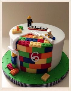 a birthday cake with lego blocks on it