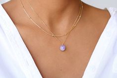 This necklace is handcrafted with much love and hight quality Amethyst. In each stone, you can see the beautiful colors of genuine  Amethyst. This dainty necklace features one genuine Amethyst pendant placed on a dainty 18k gold-filled chain.  Please note: this listing is for one necklace only. The model in the pictures is layering it with some of our beautiful accept chains and a Raw Amethyst necklace. Layer it too and take your outfit to the next level!   G E M S T O N E  February Birthstone: Lavender Natural Stones Jewelry Gift, Dainty Amethyst Jewelry With Adjustable Chain, Elegant Amethyst Jewelry With Adjustable Chain, Dainty Faceted Amethyst Jewelry, Minimalist Amethyst Gemstone Jewelry, Delicate Amethyst Jewelry For Gifts, Delicate Everyday Amethyst Jewelry, Handmade Minimalist Amethyst Jewelry, Delicate Amethyst Birthstone Jewelry