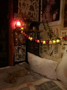 a bed with pillows and lights on it