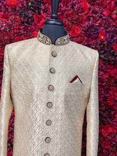 This luxurious beige sherwani features intricate embroidery in a classic pattern, crafted to perfection for a sophisticated and regal look. The sherwani is designed with a stand collar adorned with subtle embellishments, adding a refined touch to the ensemble. The button-down front and the structured fit give it a timeless appeal, making it ideal for weddings and formal occasions. Key Features: Color: Linen Off-White Color. Material: High-quality, comfortable fabric. Embroidery: Intricate all-ov Buy Lehenga Online, Indian Bridal Couture, Elegant Veils, Reception Gowns, Mehendi Outfits, Bridal Lehenga Red, Lehenga Online, Buy Jewellery Online, Indian Bridal Wear