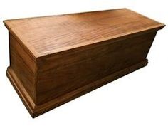 a large wooden box sitting on top of a table