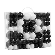 black and white balls in a clear plastic case