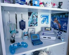 the shelves are filled with electronic gadgets and toys