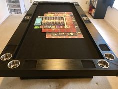 a large black table with some pictures on it